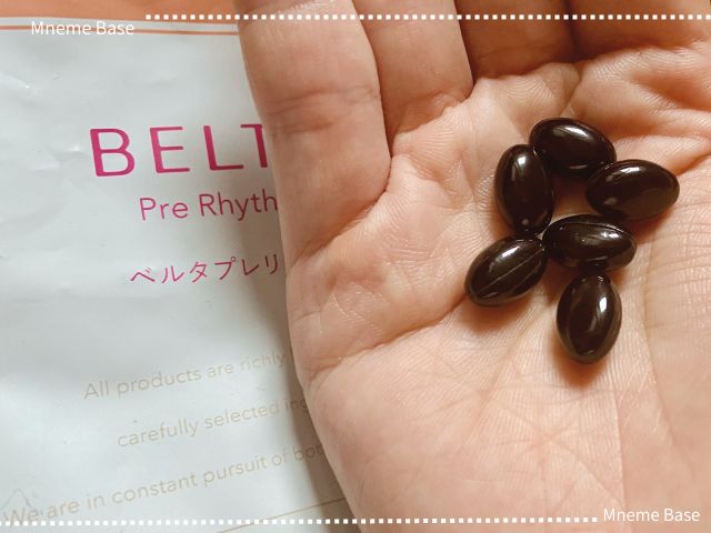 手のひらにベルタのサプリメントを置いてある画像